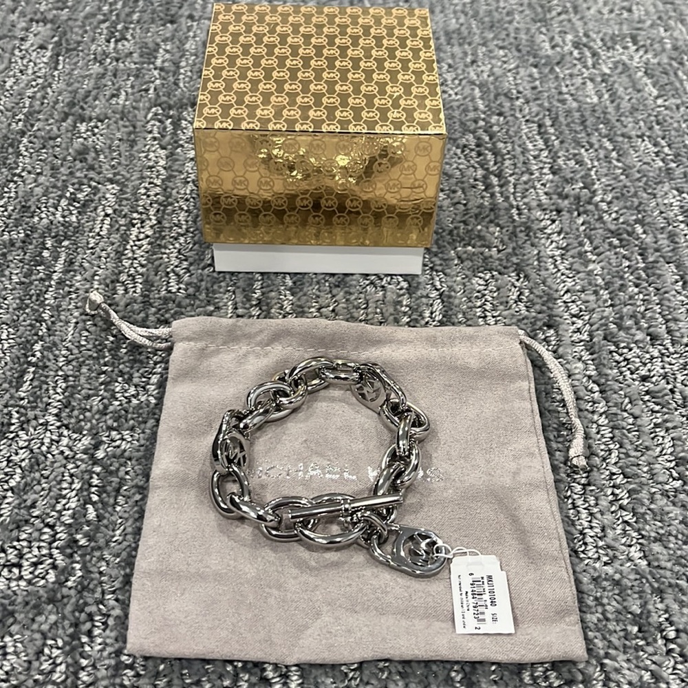 Michael Kors Womens padlock chain-link silver tone stainless steel bracelet